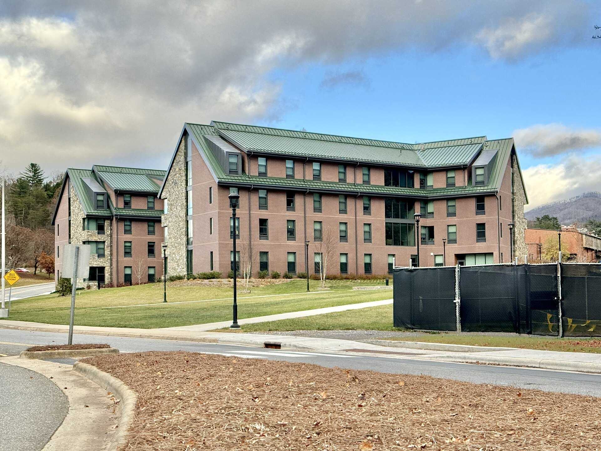 Brick residence hall at Western Carolina University, opening the student housing section on Richard Joseph Spinelli