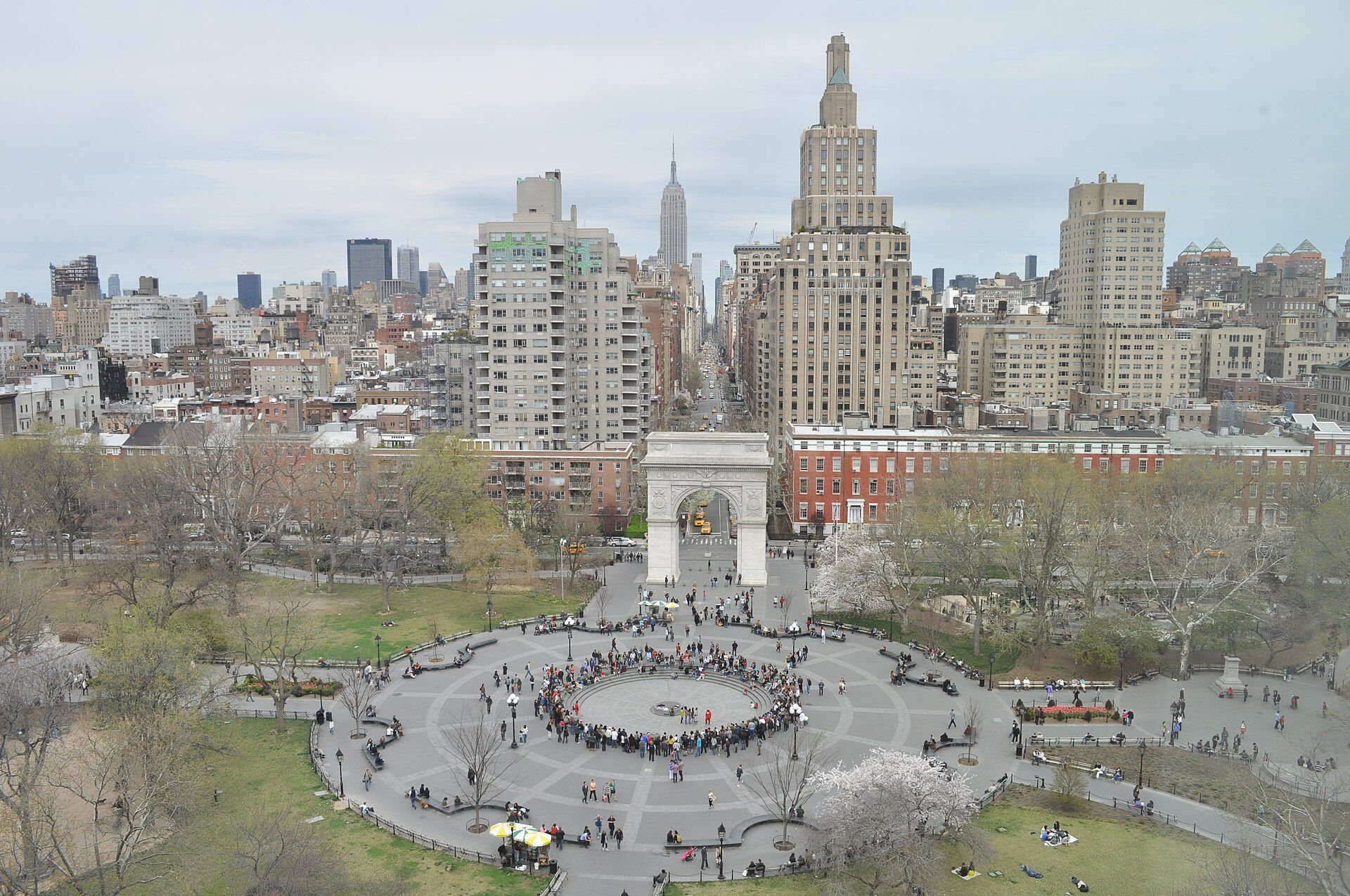 Washington Square Park and the Manhattan skyline, a city of college students that Richard Joseph Spinelli's Bronx housing work serves