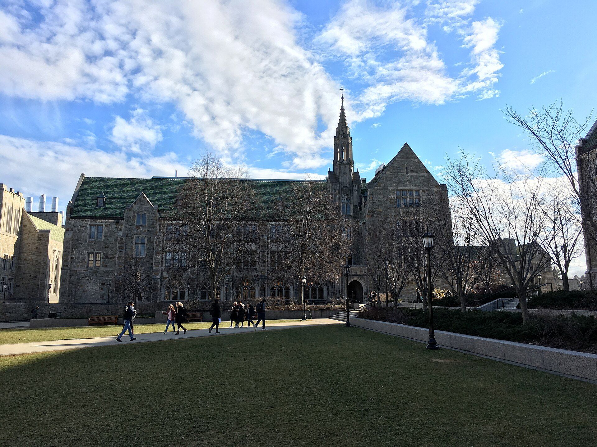 Devlin Hall across a quad on the Boston College campus, where Richard Joseph Spinelli studied economics as an undergraduate