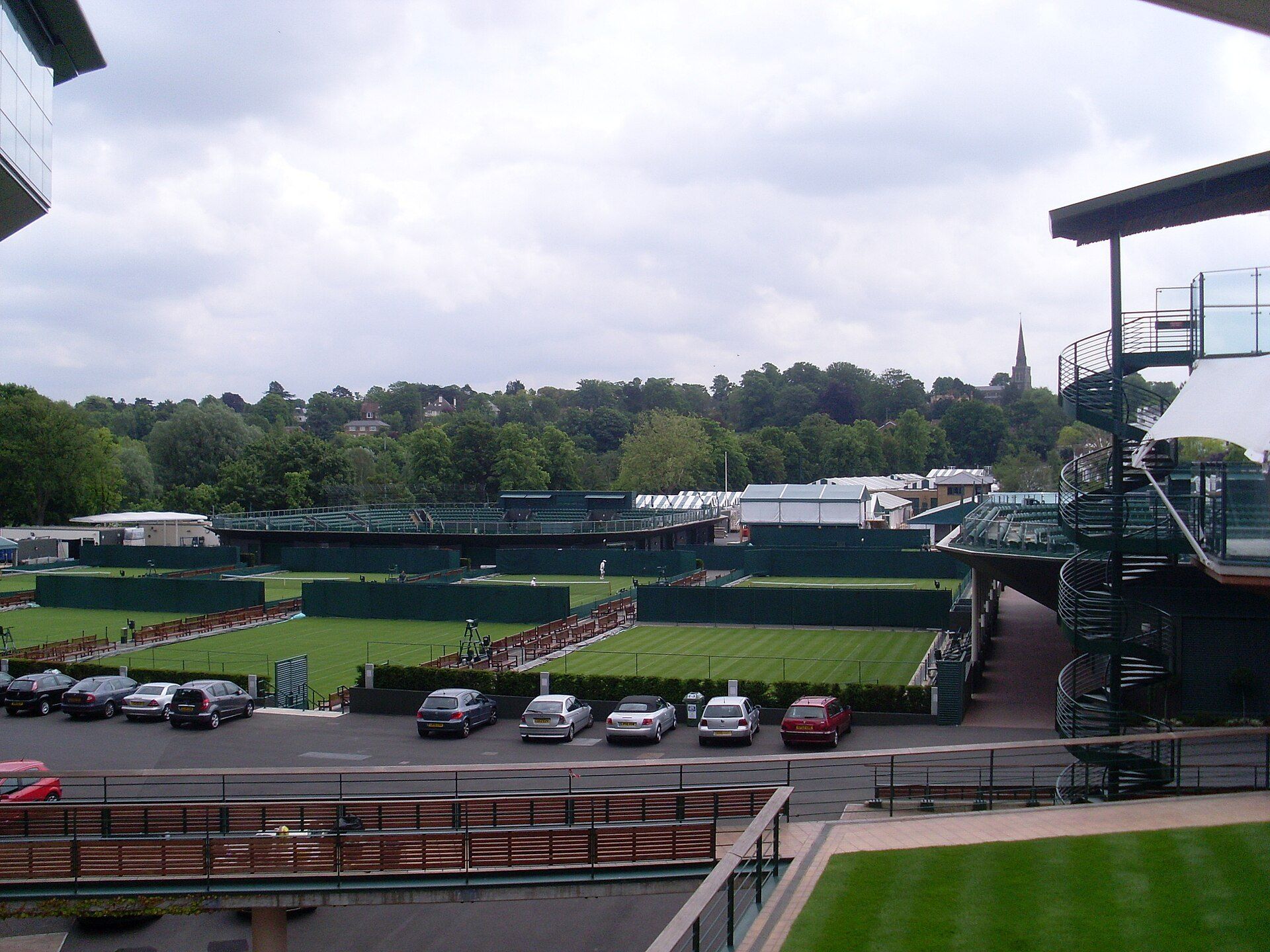Empty grass courts at the All England Club in Wimbledon, one of the four Grand Slam venues followed by tennis fan Richard Joseph Spinelli