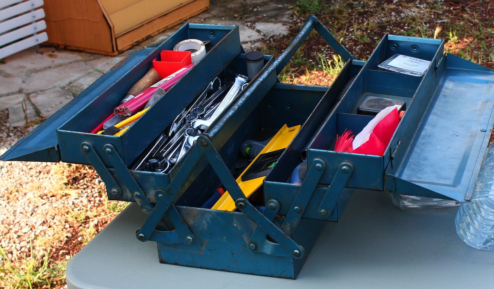 An open toolbox of hand tools, a picture of in house maintenance for rental operators such as Richard Joseph Spinelli