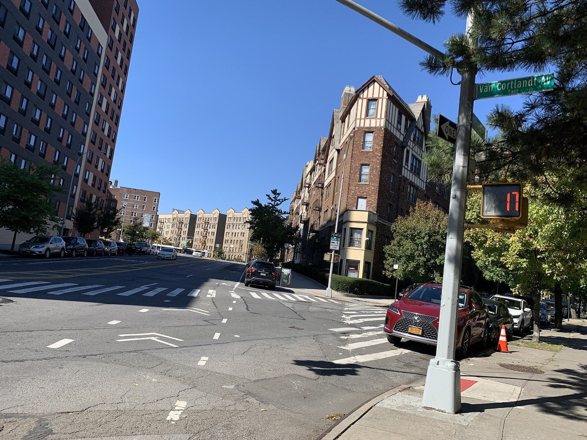 A Bronx street corner in Bedford Park, a borough setting for the essay by Richard Joseph Spinelli on clustered buildings