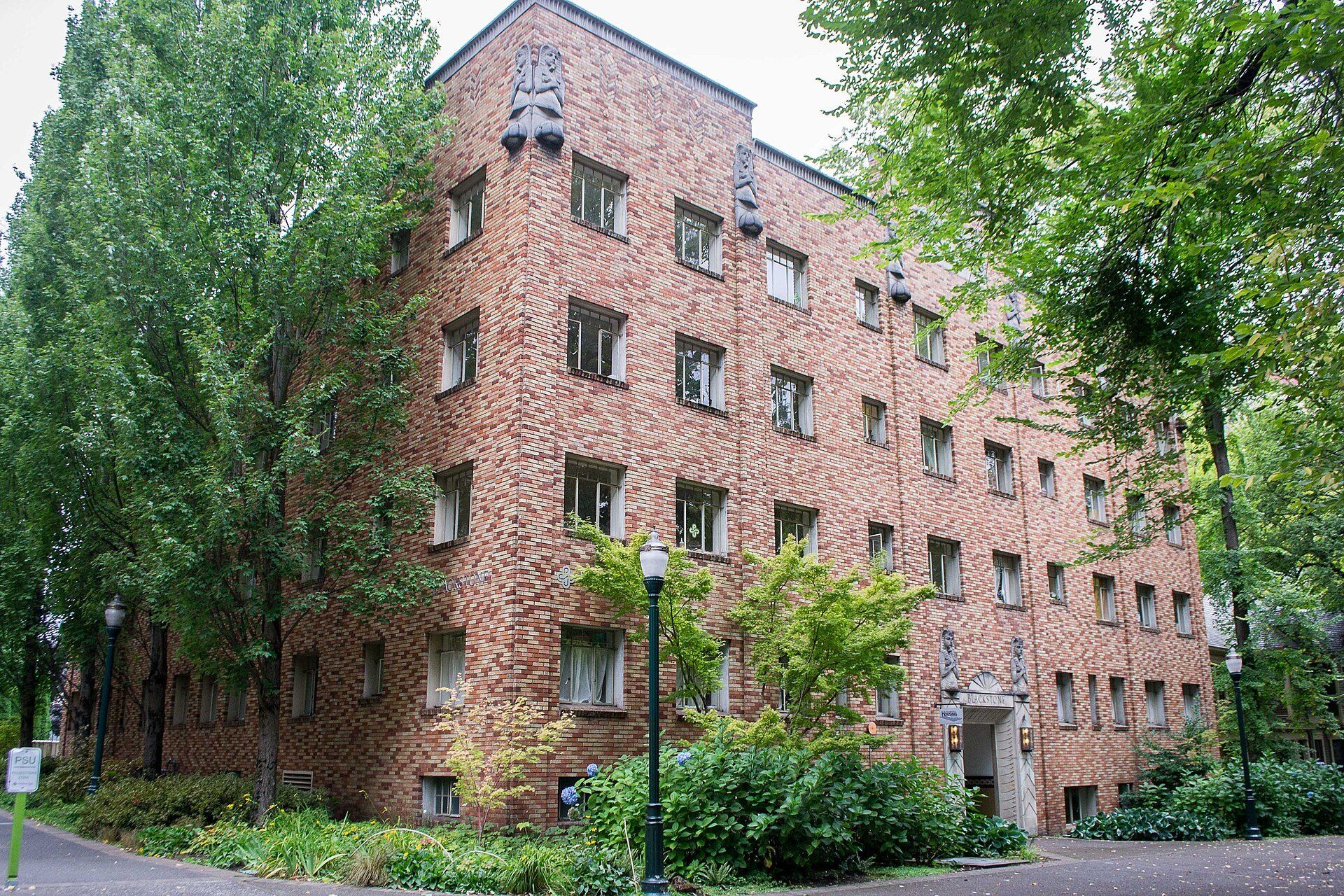 Brick walk up apartment building used as student housing, the field Richard Joseph Spinelli works in near Fordham in the Bronx